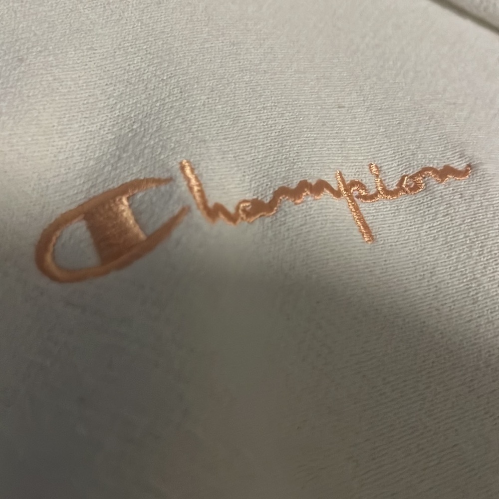 Champion. White. Pink accents stripes. Size small